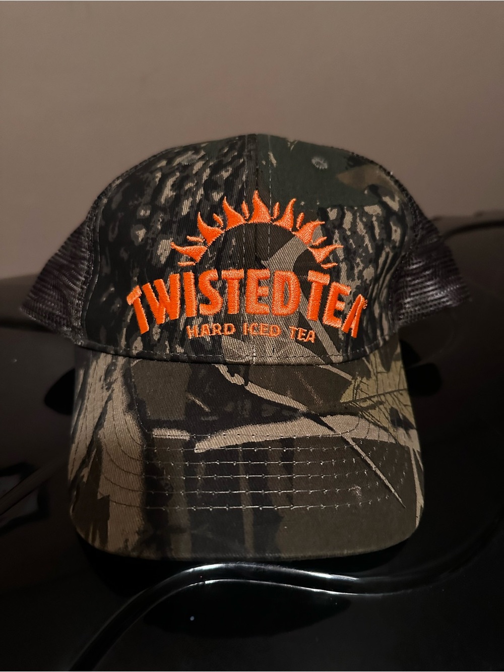 Twisted Tea Camo Trucker Hat - Orange Logo